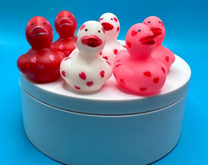 Love ducks, Valentine ducks! Mini ducks with hearts all over them. Love is in the air! Great for ducking, party favors or just because