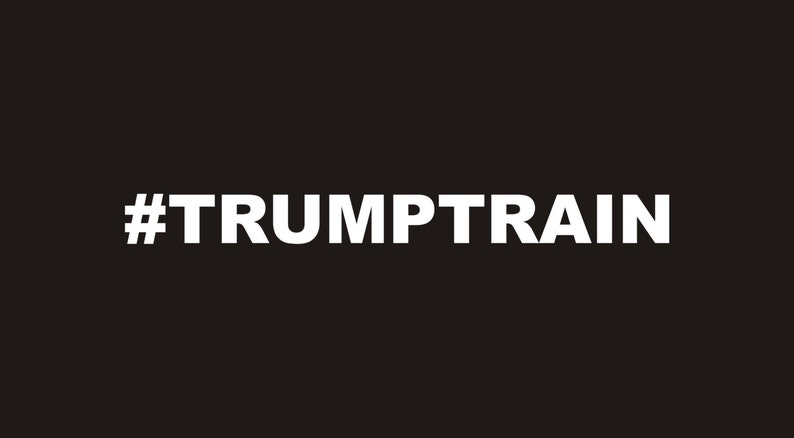 May include: White text on a black background with the hashtag #TRUMPTTRAIN.
