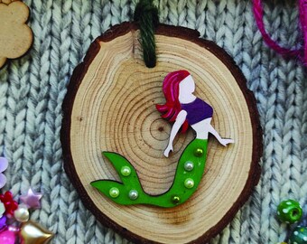 Mermaid hanging wall decoration made from wood and natural materials. Perfect small gift