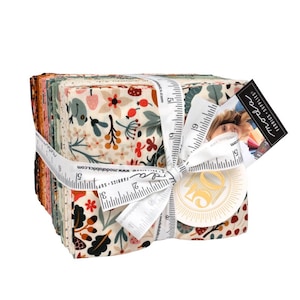 May include: A stack of fabric squares tied with a white ribbon. The fabric features a floral pattern with red, green, and cream colors. A tag with the Moda Fabrics logo is attached to the ribbon.