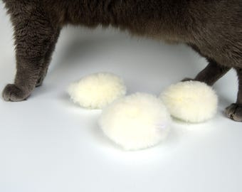 Bat Around Biscuit: Natural Sheepskin Catnip & Rattle Toy