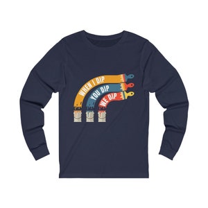 May include: Navy blue long-sleeve shirt with a paintbrush design and the text "When I Dip You Dip We Dip".