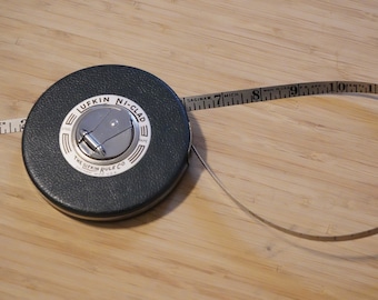 Vintage metal tape measure by Lufkin / Ni-Clad (nickel-clad), 66 ft.(20 meter)  / Saginaw, Michigan