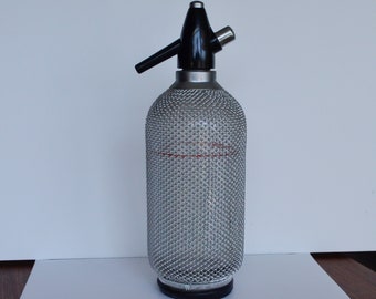 Vintage seltzer bottle, soda siphon, with mesh metal jacket - Great look - 1960s