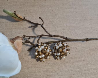 Plastic pearl clip-on earrings, gold and cream, 1970s style