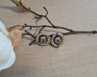 Metal ear clips, gold and silver, 1970s
