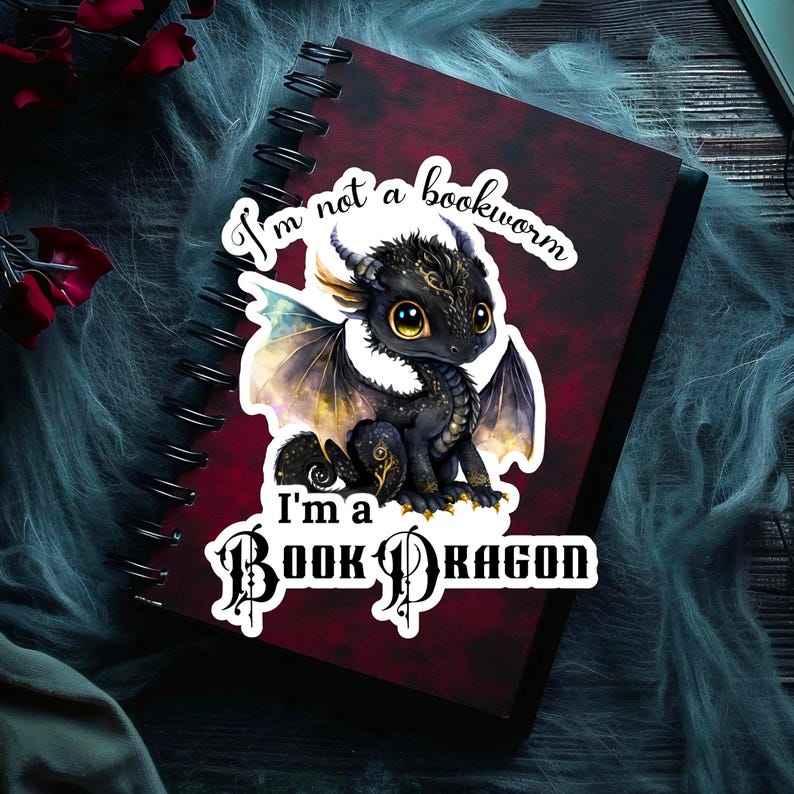 May include: A black and gold book dragon sticker with the text "I'm not a bookworm, I'm a book dragon".