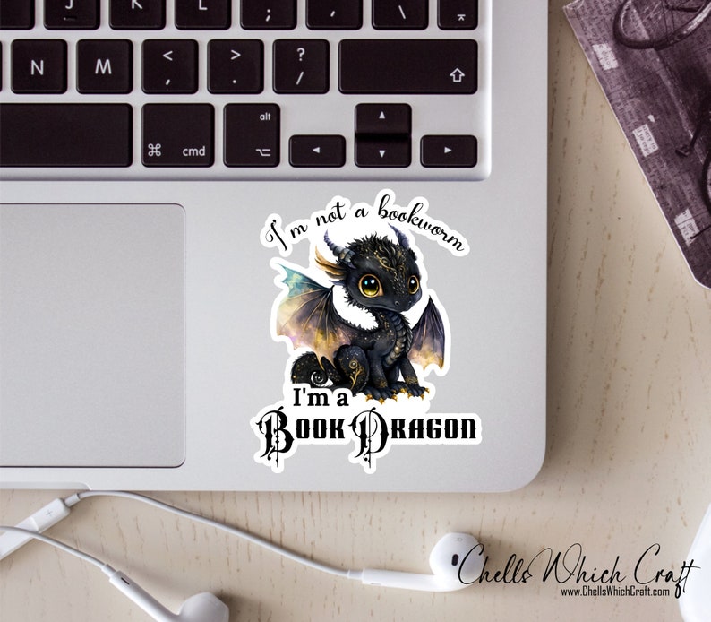 May include: A black and gold book dragon sticker with the text "I'm not a bookworm, I'm a book dragon".