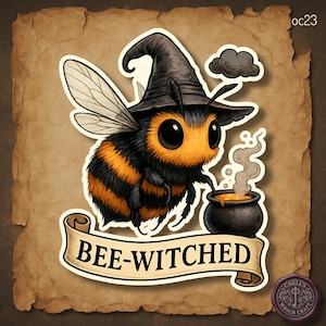 May include: A sticker illustration of a fuzzy bumblebee wearing a black pointed witch hat, standing next to a small black cauldron with orange liquid and rising steam. Below the bee is a beige scroll banner with the text BEE-WITCHED.