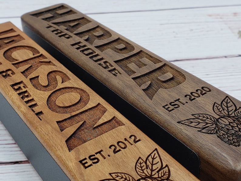 Closeup of engraving on our Laser engraved personalized beer tap handle. Available in cherry or walnut.