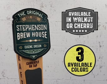 May include: A wooden beer tap handle with a green and gold sign that reads "The Original Est. 2021 Stephenson Brew House Eugene, Oregon" and a black chalkboard that says "Currently on Tap". The sign is surrounded by a decorative border. The tap handle is available in walnut or cherry.