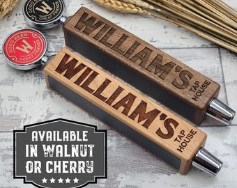 May include: Two wooden beer tap handles with the name "William's Tap House" engraved on them. The handles are available in walnut or cherry wood.