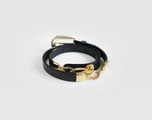 Vintage womens black leather belt with gold details, skinny black belt