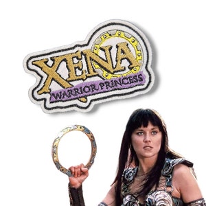 May include: Embroidered patch featuring the Xena: Warrior Princess logo. The logo is in gold and yellow with a purple banner that reads "Warrior Princess".