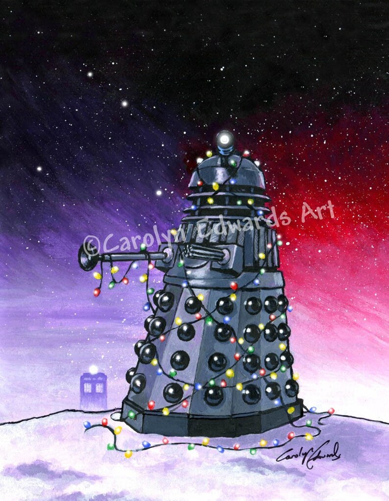May include: A black Dalek robot decorated with Christmas lights stands in a snowy landscape against a purple and red starry sky. The Dalek is holding a Christmas ornament in its arm. The text "&copy; Carolyn Edwards Art" is visible in the image.