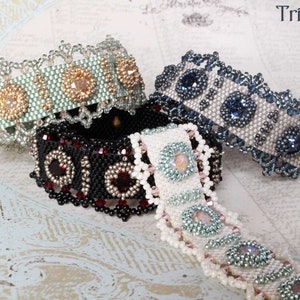 May include: Four beaded bracelets with different colored beads and crystals. The bracelets are made with a variety of techniques, including peyote stitch and brick stitch. The bracelets are all different sizes and have different designs. The bracelets are all on a white background.
