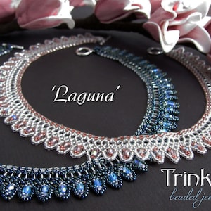 May include: Two beaded necklaces, one with silver and red beads and the other with silver and blue beads. The necklaces are called 'Laguna' and are from the shop 'Trinkets beaded jewellery'.