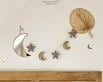 Garland of glittery stars and moons with Graou Indian Sherpa motifs for mixed interior decoration for the whole family