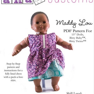 Peut inclure: Un patron de couture PDF pour une robe rose et bleue pour une poupée de 38 cm. Le patron s'appelle "Maddy Lou" et est destiné aux poupées Bitty Baby™ et Bitty Twins™. Le patron est facile à coudre et comprend des instructions étape par étape.