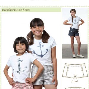 May include: A sewing pattern for a girl's pintuck shorts with an anchor graphic. The pattern includes instructions for sizes 5/6, 7/8, 9/10, 11/12, and 13/14. The pattern is labeled "Isabelle Pintuck Short" and is from the Bonjour Teaspoon collection.