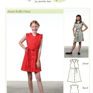 May include: A sewing pattern for a red and white polka dot dress with a ruffle trim. The pattern is called "Annie Ruffle Dress" and is from Bonjour Teaspoon. The pattern includes instructions for sizes 6/6 to 13/14. The pattern is for an advanced beginner skill level.