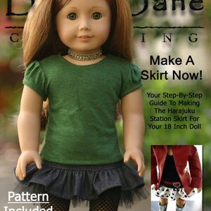 May include: A doll wearing a green t-shirt, a black skirt, and black fishnet tights. The doll is holding a sewing pattern for a skirt. The text on the pattern says "Make A Skirt Now!" and "Your Step-By-Step Guide To Making The Harajuku Station Skirt For Your 18 Inch Doll".