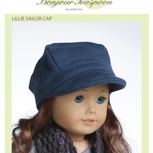 May include: A blue sailor cap sewing pattern for 18-inch dolls. The pattern is called "Lillie Sailor Cap" and is by Bonjour Teaspoon. The sewing level is intermediate.