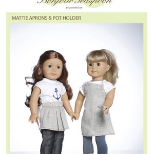 May include: Sewing pattern for 18-inch dolls, featuring two dolls wearing aprons. The pattern is titled "Mattie Aprons & Pot Holder" and is by Jennifer Serr. The skill level is listed as Intermediate.
