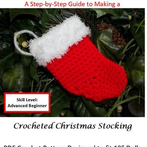 May include: Crocheted red and white Christmas stocking for 18 inch dolls. The stocking is designed to fit dolls such as American Girl dolls. The pattern is available as a PDF download. "Skill Level: Advanced Beginner" is written on the image.
