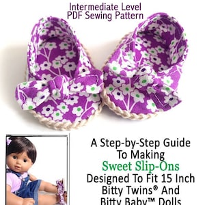May include: A PDF sewing pattern for making bow tie slip-on shoes for 15-inch Bitty Twins and Bitty Baby dolls. The pattern includes a step-by-step guide and is designed for intermediate sewers. The image shows a pair of purple and white floral slip-on shoes with a bow tie detail.