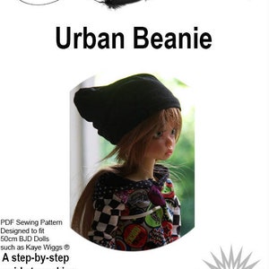 May include: A PDF sewing pattern for a black beanie designed to fit 50cm BJD dolls, such as Kaye Wiggs dolls. The pattern includes a step-by-step guide to making the beanie. The skill level is easy.