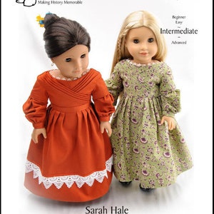 May include: Two 18-inch dolls wearing dresses. The doll on the left is wearing a red dress with white lace trim. The doll on the right is wearing a green dress with a floral print. The text "Sarah Hale" is printed below the dolls.