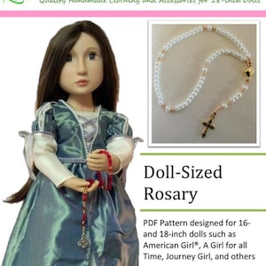 May include: A PDF pattern for a doll-sized rosary, designed for 16- and 18-inch dolls. The pattern is suitable for dolls such as American Girl, A Girl for All Time, Journey Girl, and others. The image shows a doll holding a red rosary and a close-up of a white pearl rosary with a gold cross.
