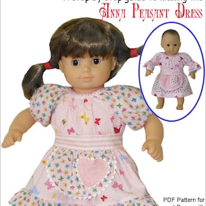 May include: A step-by-step guide to making an "Anna Peasant Dress" for 15-inch baby dolls. The pattern includes sleeve and skirt choices, an optional apron, and is designed for Bitty Baby and Bitty Twin dolls. The image shows a doll wearing a pink dress with butterflies and a heart-shaped apron.