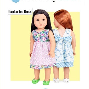 May include: A sewing pattern for a Garden Tea Dress, designed to fit 18-inch dolls. The image shows two dolls wearing the dresses. The pattern is labeled as beginner level. The text "123 Mulberry Street" is at the top.