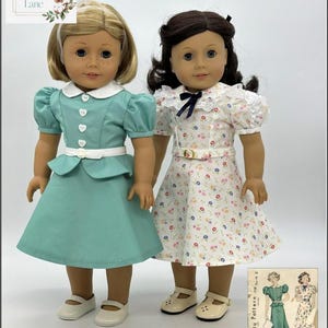 May include: Two dolls in vintage dresses. One doll wears a teal dress with a white collar and belt, the other a floral print dress. The image includes the text "Let's Be Friends!" and a pattern for 45.7 cm dolls.