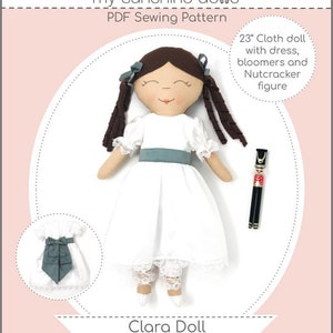May include: A PDF sewing pattern for a 23-inch cloth doll named Clara. The doll is wearing a white dress with a blue sash, white bloomers, and a white lace trim. The pattern includes instructions for making a Nutcracker figure. The pattern is part of the Holiday Collection and is labeled as Intermediate.