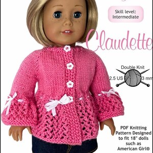 May include: A pink knitted cardigan with white buttons and white ribbon accents. The cardigan is designed to fit 18-inch dolls, such as American Girl dolls. The knitting pattern is for a double knit project using 2.5 US size needles and 3 mm yarn.