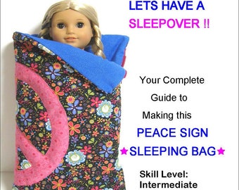 May include: A doll with blonde hair peeks out of a blue and floral sleeping bag. The sleeping bag has a pink peace sign and is designed for 18-inch dolls. Text on the image reads "Let's Have a Sleepover!!" and "Peace Sign Sleeping Bag."