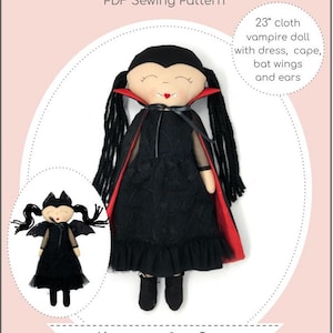 May include: A PDF sewing pattern for a 23-inch cloth vampire doll with a black dress, red cape, bat wings, and ears. The doll has black hair in pigtails and a red heart on her cheek. The pattern is titled "Vampire Bat Doll" and is labeled as "Intermediate".
