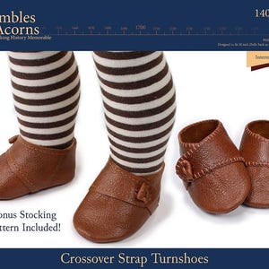 May include: Brown leather crossover strap turnshoes for 18 inch dolls. The shoes have a stitched seam detail and a buckle closure. The pattern is for intermediate sewers.