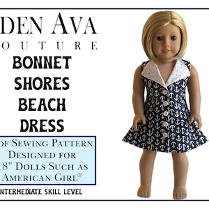 May include: PDF sewing pattern for an 18-inch doll dress. The dress is blue with white anchors and a white collar. The pattern is called "Bonnet Shores Beach Dress" and is designed for dolls such as American Girl. The pattern is for an intermediate skill level.