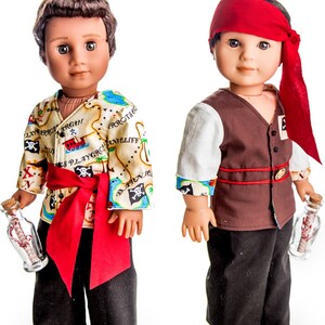 May include: Two dolls dressed as pirates. One doll is wearing a red bandana, a brown vest, and black pants. The other doll is wearing a red sash, black pants, and a shirt with a pirate map print. Both dolls are holding a bottle with a rolled up message inside.