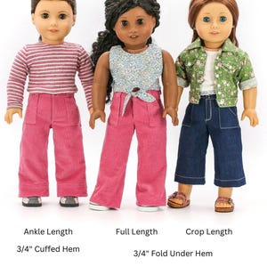 May include: Three dolls wearing different styles of pants. The doll on the left is wearing pink corduroy pants with a 3/4" cuffed hem. The doll in the middle is wearing pink corduroy pants with a 3/4" fold under hem. The doll on the right is wearing blue denim pants with a 3/4" fold under hem.
