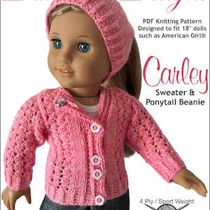 May include: A pink knitted sweater and matching ponytail beanie designed for 18-inch dolls. The sweater has a V-neck and button closure. The beanie has a simple design with a folded brim. The knitting pattern is for an intermediate skill level. The yarn is 4 ply sport weight and the needles are size 2 UK (2.75 mm).
