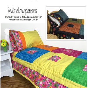 Pode incluir: Uma colcha para boneca amarela, rosa, azul e verde com uma borda de estampa floral. A colcha mede 43 cm por 58 cm e é projetada para caber em uma cama de boneca. A colcha é feita para bonecas de 46 cm como as bonecas American Girl. A colcha é um padrão de colcha PDF de nível iniciante.