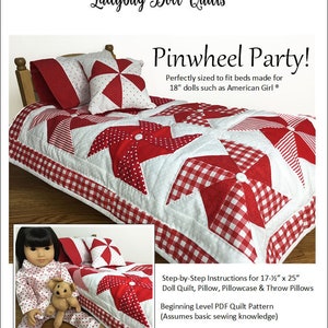 May include: A red and white pinwheel quilt set for a 18-inch doll bed. The set includes a quilt, pillow, pillowcase, and throw pillows. The quilt is made with a white background and red pinwheels. The pillowcase is red and white gingham. The throw pillows are red and white polka dot. The quilt is perfect for a doll bed and is a great way to add a touch of whimsy to any doll's room.  Step-by-Step Instructions for 17-½" x 25" Doll Quilt, Pillow, Pillowcase & Throw Pillows Beginning Level PDF Quilt Pattern (Assumes basic sewing knowledge)