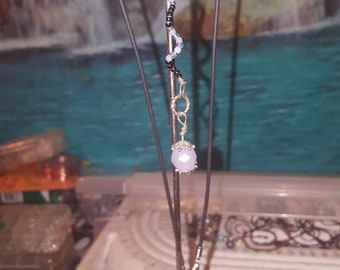 Necklace with spiral pendant