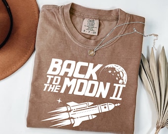 Koszulka „Back to the Moon II” | Koszulka z nadrukiem Space Launch | Koszulka z motywem rakiety | Prezent rakietowy | Koszulka dla entuzjastów kosmosu | Comfort Colors® lub bluza z kapturem