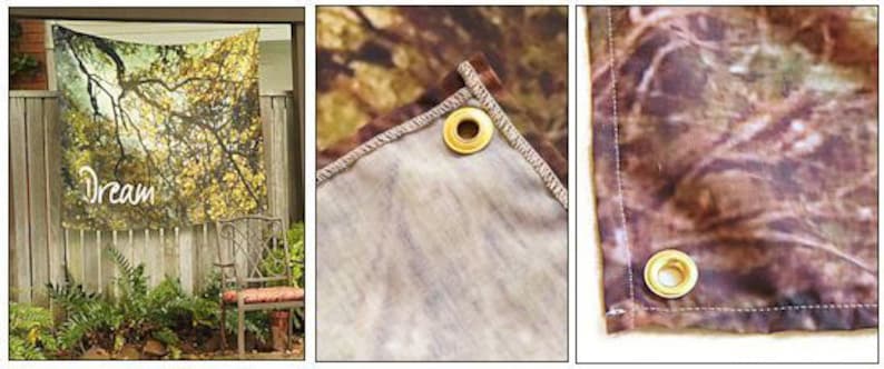 May include: A tapestry with a woodland scene and the word "Dream" printed on it. The tapestry has a brown, tan, and green color scheme and is made of a soft, woven fabric. The tapestry has grommets on the top for hanging.